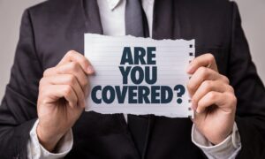 man holding paper asking about medical coverage